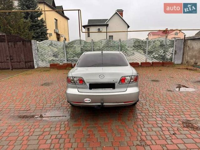 Сірий Мазда 3, об'ємом двигуна 2 л та пробігом 171 тис. км за 5600 $, фото 3 на Automoto.ua