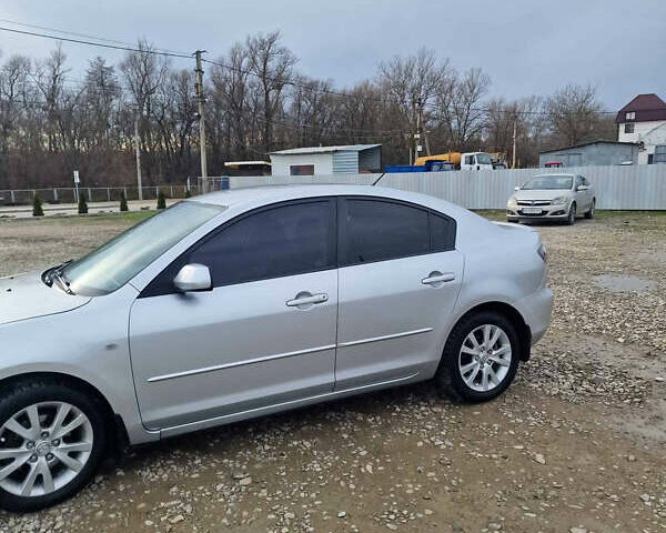Серый Мазда 3, объемом двигателя 1.6 л и пробегом 223 тыс. км за 3950 $, фото 1 на Automoto.ua