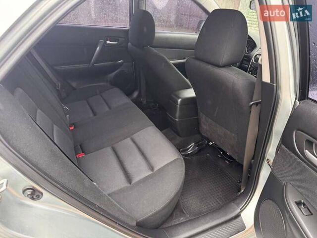 Сірий Мазда 3, об'ємом двигуна 2 л та пробігом 171 тис. км за 5600 $, фото 13 на Automoto.ua