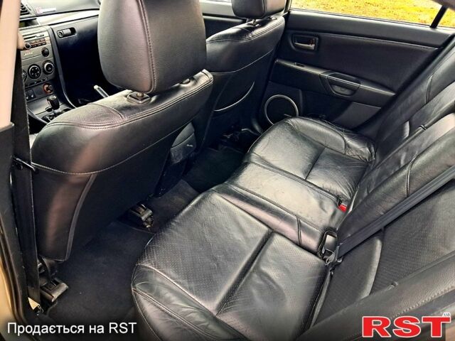 Сірий Мазда 3, об'ємом двигуна 2 л та пробігом 217 тис. км за 4800 $, фото 8 на Automoto.ua