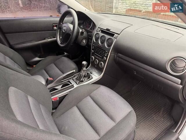 Сірий Мазда 3, об'ємом двигуна 2 л та пробігом 171 тис. км за 5600 $, фото 9 на Automoto.ua