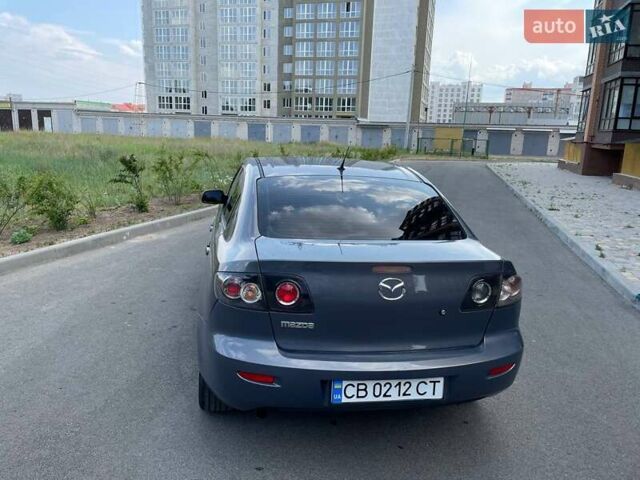 Серый Мазда 3, объемом двигателя 1.6 л и пробегом 149 тыс. км за 5200 $, фото 12 на Automoto.ua