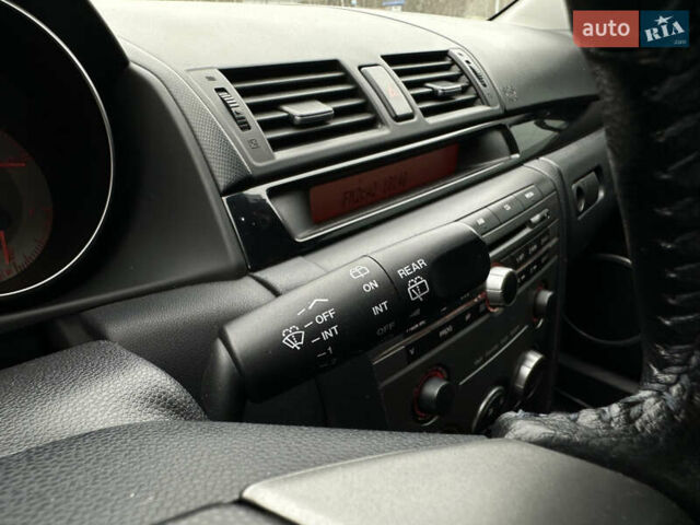 Серый Мазда 3, объемом двигателя 2 л и пробегом 188 тыс. км за 4999 $, фото 22 на Automoto.ua