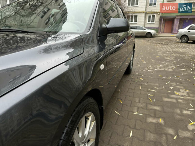 Сірий Мазда 3, об'ємом двигуна 2 л та пробігом 189 тис. км за 4750 $, фото 5 на Automoto.ua