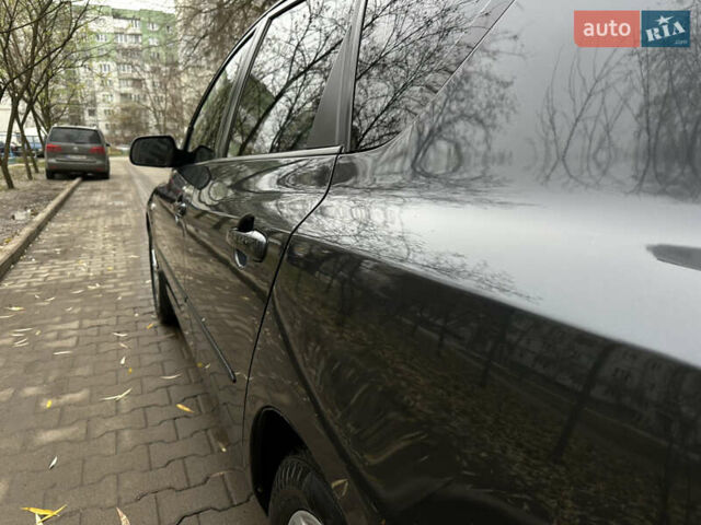 Сірий Мазда 3, об'ємом двигуна 2 л та пробігом 189 тис. км за 4750 $, фото 11 на Automoto.ua