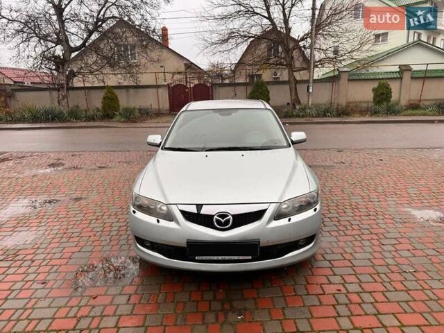 Сірий Мазда 3, об'ємом двигуна 2 л та пробігом 171 тис. км за 5600 $, фото 4 на Automoto.ua