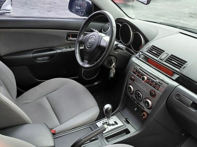 Сірий Мазда 3, об'ємом двигуна 1.6 л та пробігом 248 тис. км за 5600 $, фото 14 на Automoto.ua