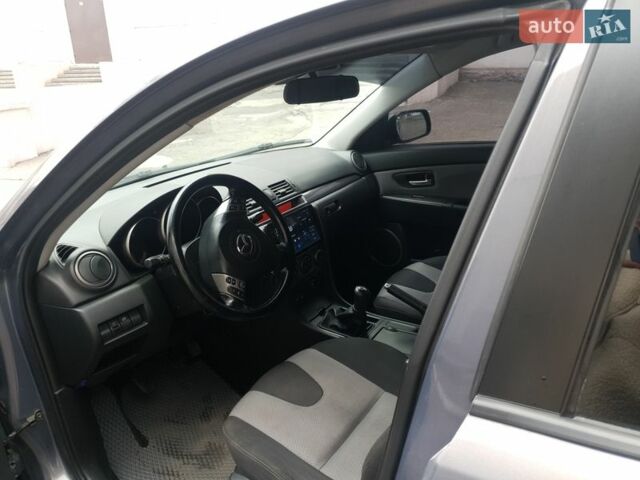 Сірий Мазда 3, об'ємом двигуна 2 л та пробігом 165 тис. км за 6500 $, фото 6 на Automoto.ua