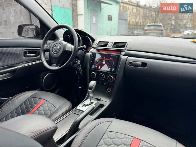 Серый Мазда 3, объемом двигателя 1.6 л и пробегом 200 тыс. км за 6500 $, фото 9 на Automoto.ua