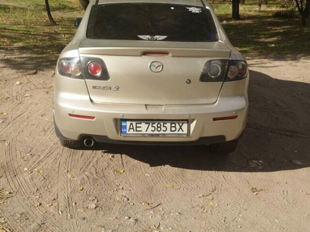 Сірий Мазда 3, об'ємом двигуна 2 л та пробігом 325 тис. км за 3900 $, фото 3 на Automoto.ua