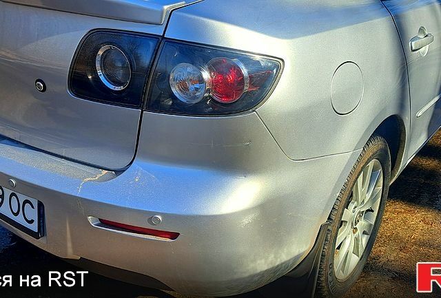 Серый Мазда 3, объемом двигателя 1.6 л и пробегом 174 тыс. км за 6200 $, фото 3 на Automoto.ua