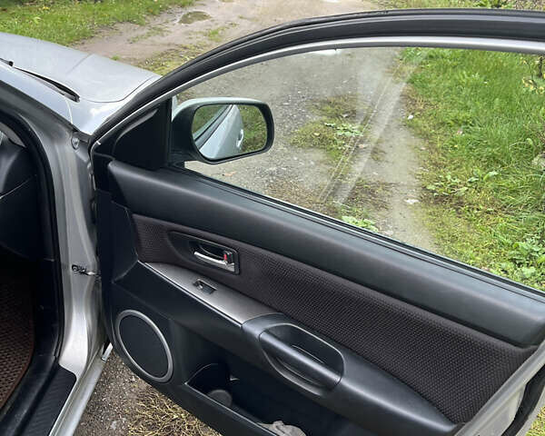 Серый Мазда 3, объемом двигателя 1.6 л и пробегом 305 тыс. км за 5500 $, фото 13 на Automoto.ua