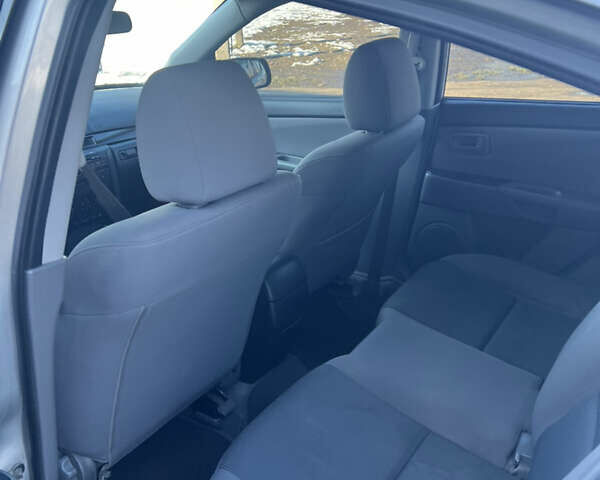 Серый Мазда 3, объемом двигателя 1.6 л и пробегом 212 тыс. км за 2700 $, фото 9 на Automoto.ua