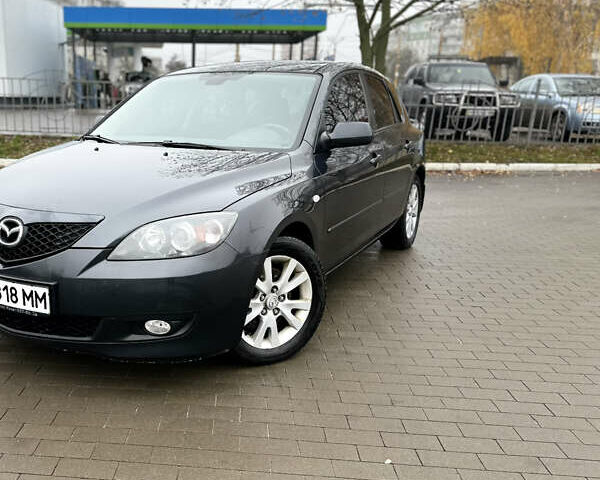 Серый Мазда 3, объемом двигателя 2 л и пробегом 188 тыс. км за 4999 $, фото 1 на Automoto.ua