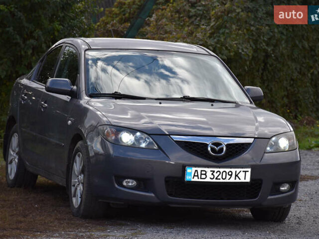 Серый Мазда 3, объемом двигателя 1.6 л и пробегом 128 тыс. км за 6100 $, фото 1 на Automoto.ua