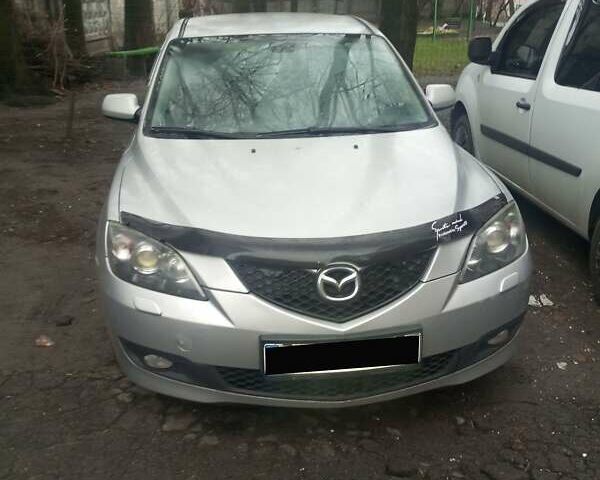 Серый Мазда 3, объемом двигателя 1.6 л и пробегом 175 тыс. км за 5500 $, фото 1 на Automoto.ua
