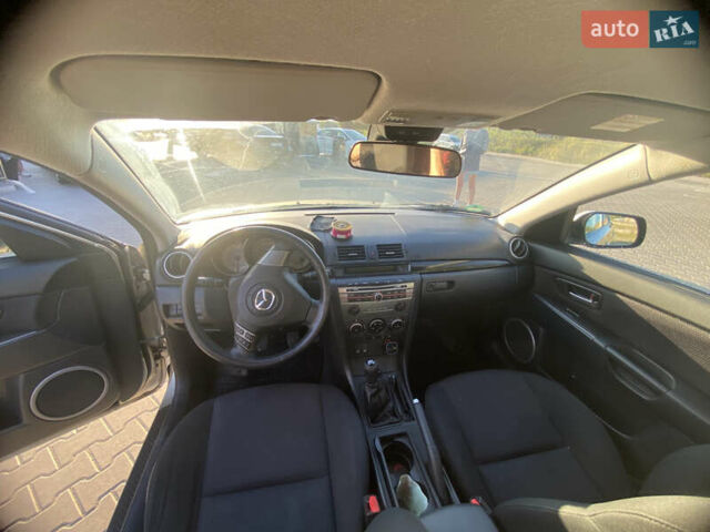 Серый Мазда 3, объемом двигателя 1.6 л и пробегом 200 тыс. км за 5600 $, фото 5 на Automoto.ua