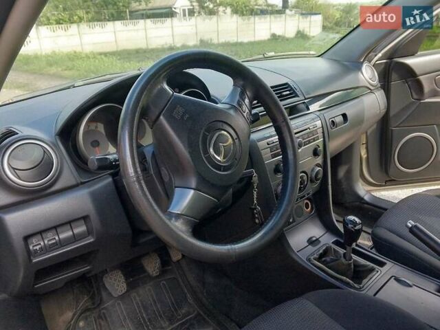Серый Мазда 3, объемом двигателя 1.6 л и пробегом 186 тыс. км за 5000 $, фото 6 на Automoto.ua