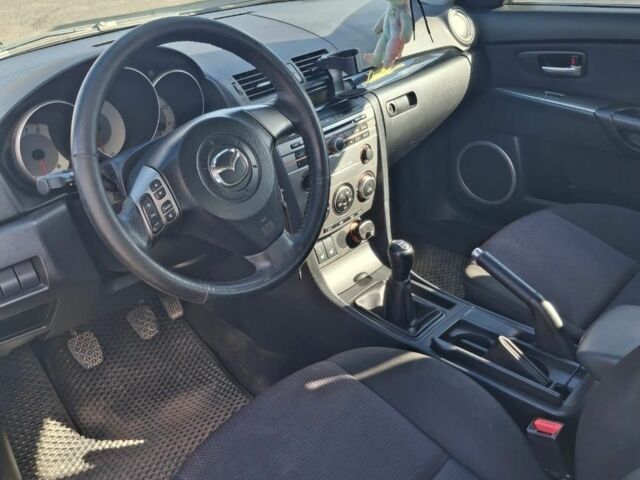 Серый Мазда 3, объемом двигателя 1.6 л и пробегом 147 тыс. км за 5500 $, фото 4 на Automoto.ua