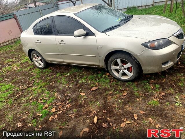 Серый Мазда 3, объемом двигателя 2 л и пробегом 307 тыс. км за 5250 $, фото 1 на Automoto.ua