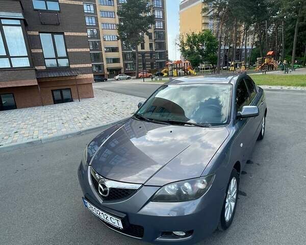 Серый Мазда 3, объемом двигателя 1.6 л и пробегом 149 тыс. км за 5200 $, фото 1 на Automoto.ua