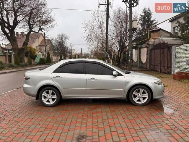 Сірий Мазда 3, об'ємом двигуна 2 л та пробігом 171 тис. км за 5600 $, фото 6 на Automoto.ua