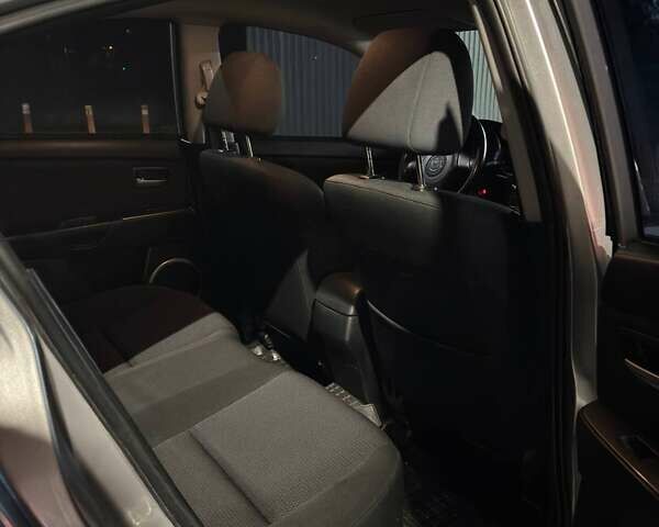 Сірий Мазда 3, об'ємом двигуна 1.6 л та пробігом 172 тис. км за 5600 $, фото 8 на Automoto.ua