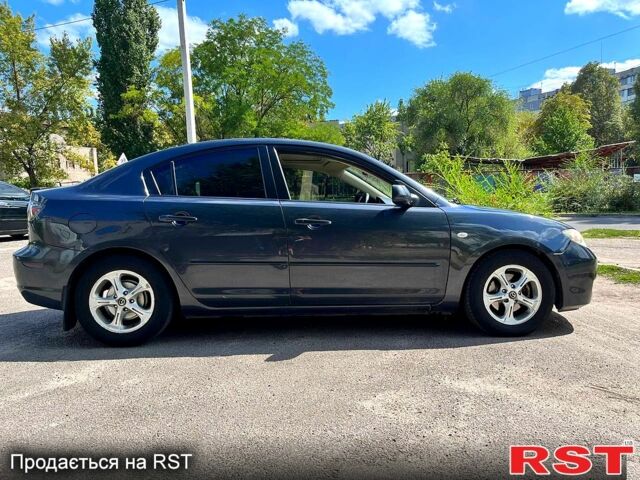 Серый Мазда 3, объемом двигателя 1.6 л и пробегом 207 тыс. км за 5200 $, фото 4 на Automoto.ua