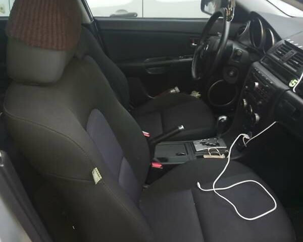 Серый Мазда 3, объемом двигателя 1.6 л и пробегом 175 тыс. км за 5500 $, фото 3 на Automoto.ua