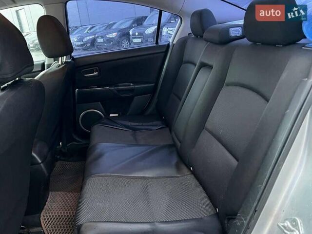 Серый Мазда 3, объемом двигателя 1.6 л и пробегом 305 тыс. км за 5940 $, фото 30 на Automoto.ua