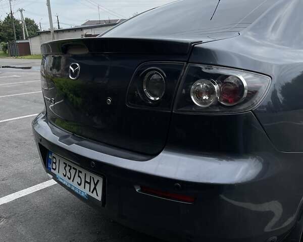 Серый Мазда 3, объемом двигателя 1.6 л и пробегом 199 тыс. км за 6000 $, фото 4 на Automoto.ua
