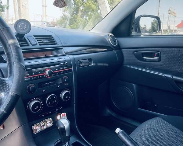 Серый Мазда 3, объемом двигателя 1.6 л и пробегом 250 тыс. км за 5800 $, фото 12 на Automoto.ua
