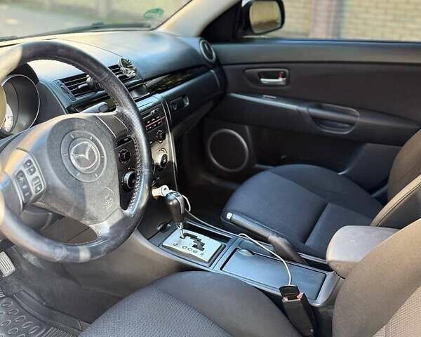 Серый Мазда 3, объемом двигателя 1.6 л и пробегом 270 тыс. км за 5950 $, фото 14 на Automoto.ua