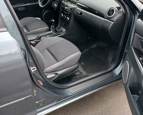 Серый Мазда 3, объемом двигателя 1.6 л и пробегом 223 тыс. км за 5600 $, фото 8 на Automoto.ua