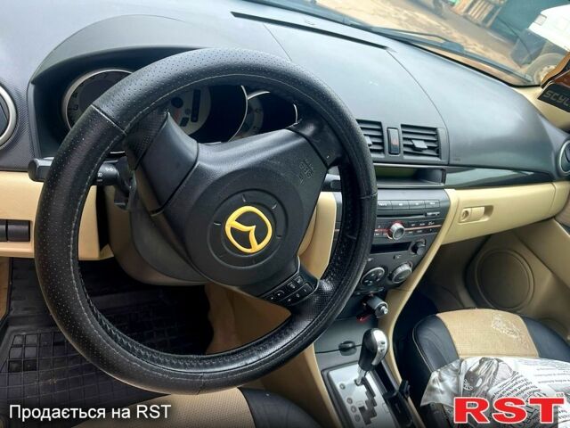 Серый Мазда 3, объемом двигателя 1.6 л и пробегом 219 тыс. км за 5800 $, фото 3 на Automoto.ua