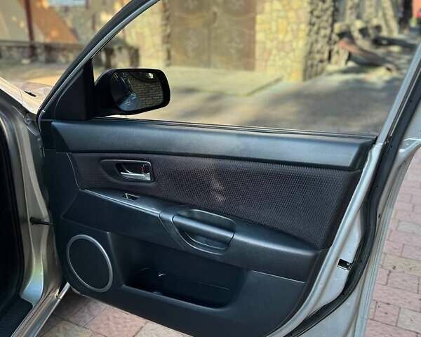 Серый Мазда 3, объемом двигателя 1.6 л и пробегом 270 тыс. км за 5950 $, фото 9 на Automoto.ua