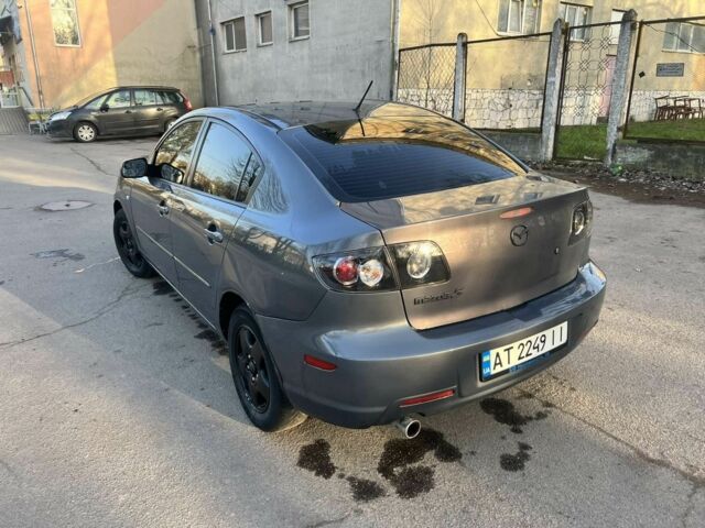 Серый Мазда 3, объемом двигателя 2 л и пробегом 290 тыс. км за 5700 $, фото 3 на Automoto.ua