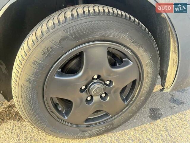 Мазда 3 2008 в Змиеве на Automoto.ua Серый Мазда 3, объемом двигателя 2 л и пробегом 290 тыс. км за 5700 $, фото 7 на Automoto.ua