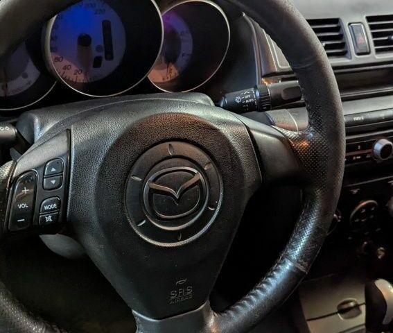 Серый Мазда 3, объемом двигателя 1.6 л и пробегом 10 тыс. км за 2000 $, фото 5 на Automoto.ua