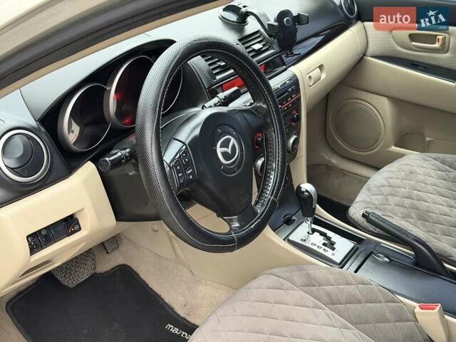 Серый Мазда 3, объемом двигателя 1.6 л и пробегом 170 тыс. км за 6000 $, фото 8 на Automoto.ua