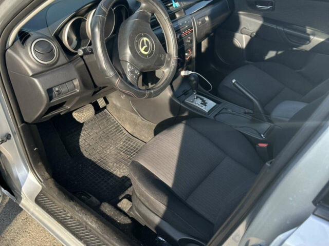 Сірий Мазда 3, об'ємом двигуна 2 л та пробігом 215 тис. км за 5100 $, фото 3 на Automoto.ua
