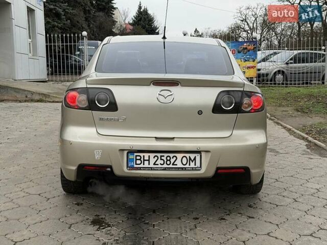 Серый Мазда 3, объемом двигателя 1.6 л и пробегом 170 тыс. км за 6000 $, фото 4 на Automoto.ua