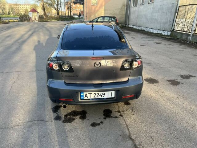 Серый Мазда 3, объемом двигателя 2 л и пробегом 290 тыс. км за 5700 $, фото 4 на Automoto.ua