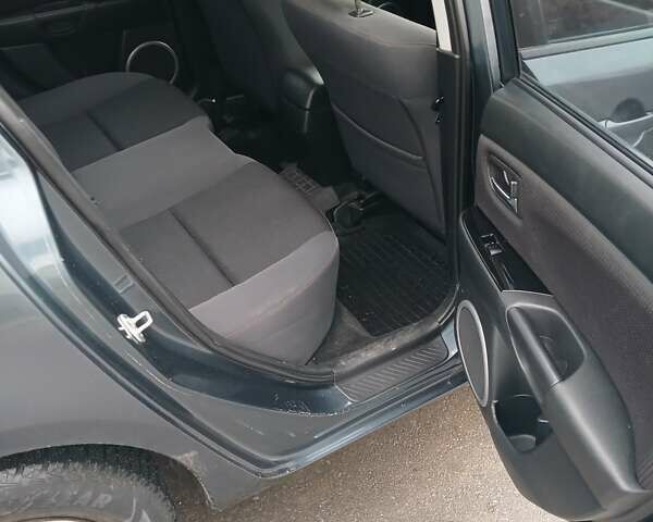 Серый Мазда 3, объемом двигателя 1.6 л и пробегом 223 тыс. км за 5600 $, фото 9 на Automoto.ua