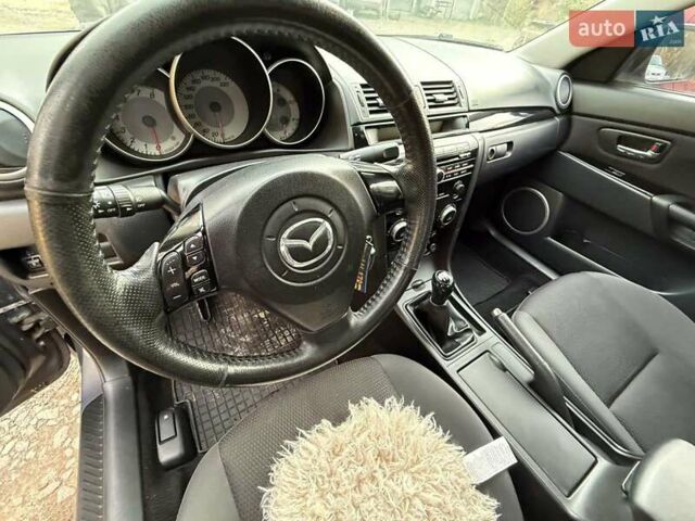 Серый Мазда 3, объемом двигателя 1.6 л и пробегом 230 тыс. км за 4000 $, фото 1 на Automoto.ua