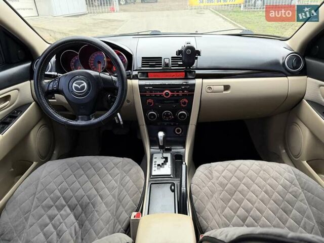 Серый Мазда 3, объемом двигателя 1.6 л и пробегом 170 тыс. км за 6000 $, фото 13 на Automoto.ua