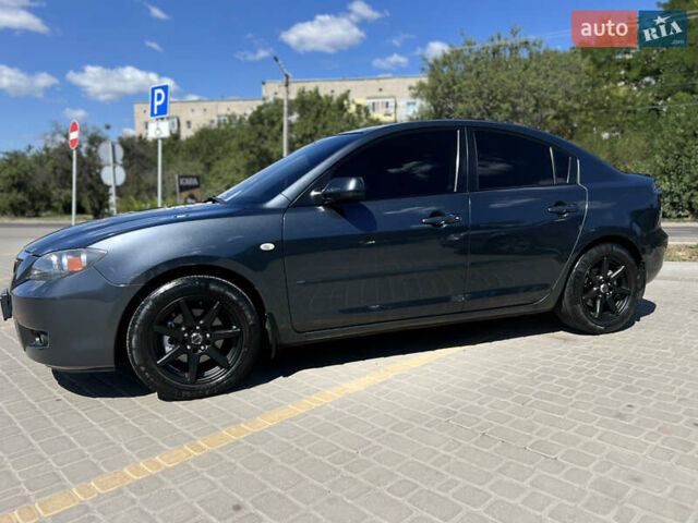 Серый Мазда 3, объемом двигателя 1.6 л и пробегом 246 тыс. км за 6400 $, фото 11 на Automoto.ua