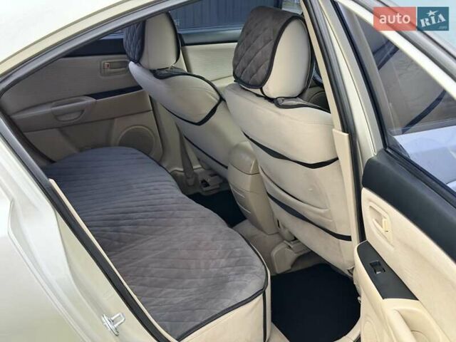 Серый Мазда 3, объемом двигателя 1.6 л и пробегом 170 тыс. км за 6000 $, фото 10 на Automoto.ua