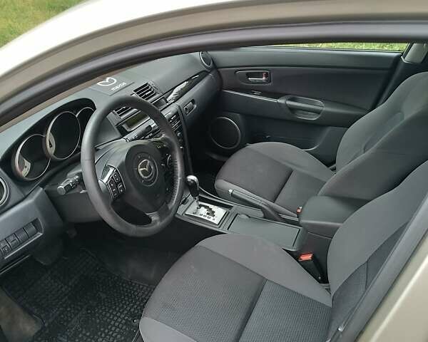 Сірий Мазда 3, об'ємом двигуна 1.6 л та пробігом 348 тис. км за 5000 $, фото 4 на Automoto.ua