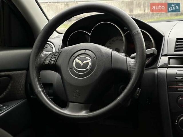 Серый Мазда 3, объемом двигателя 1.6 л и пробегом 216 тыс. км за 5900 $, фото 9 на Automoto.ua